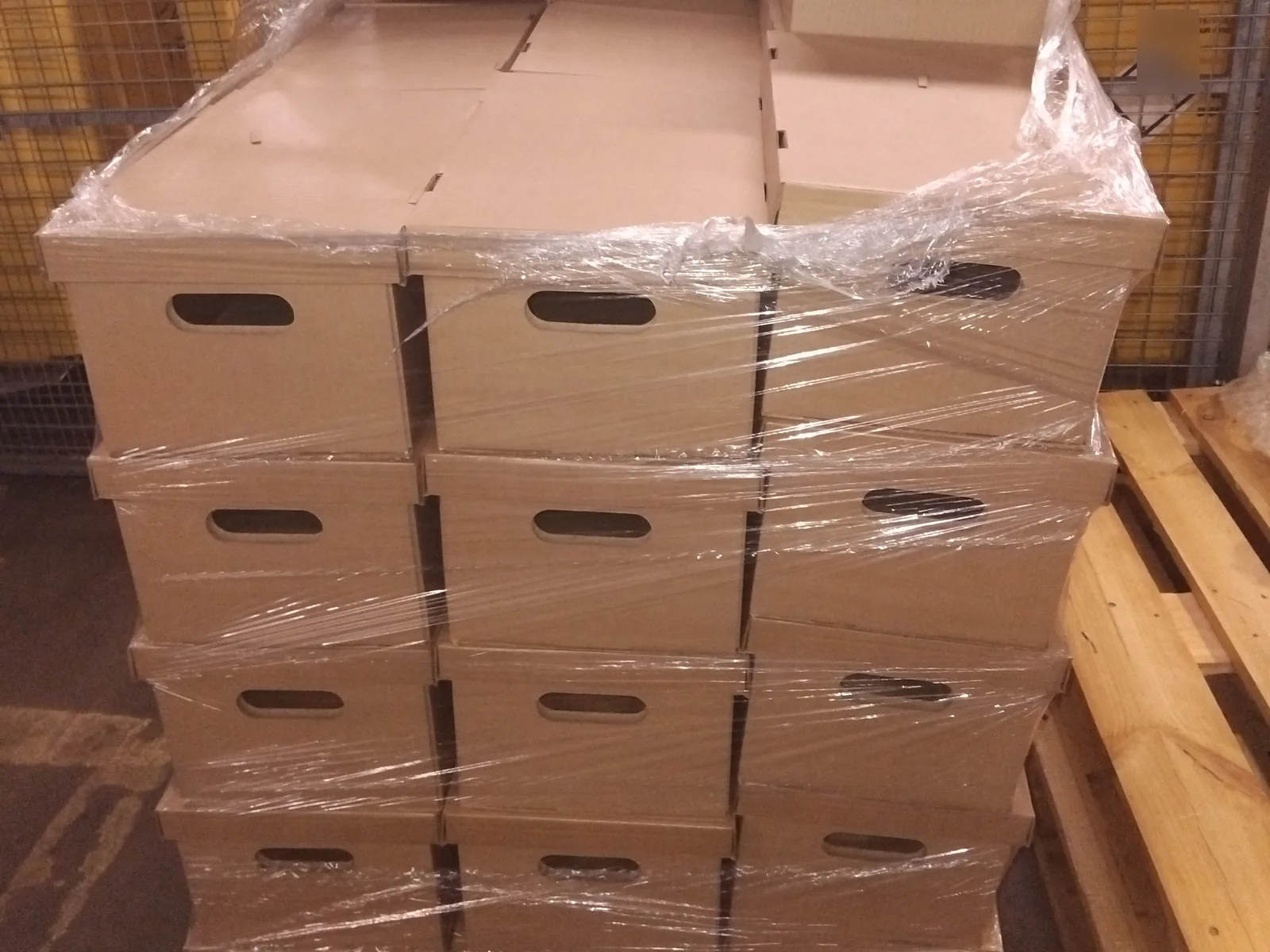 Shrink-wrapped pallet of stacked cardboard cartons ready for Red Eagle Logistics nationwide pallet delivery