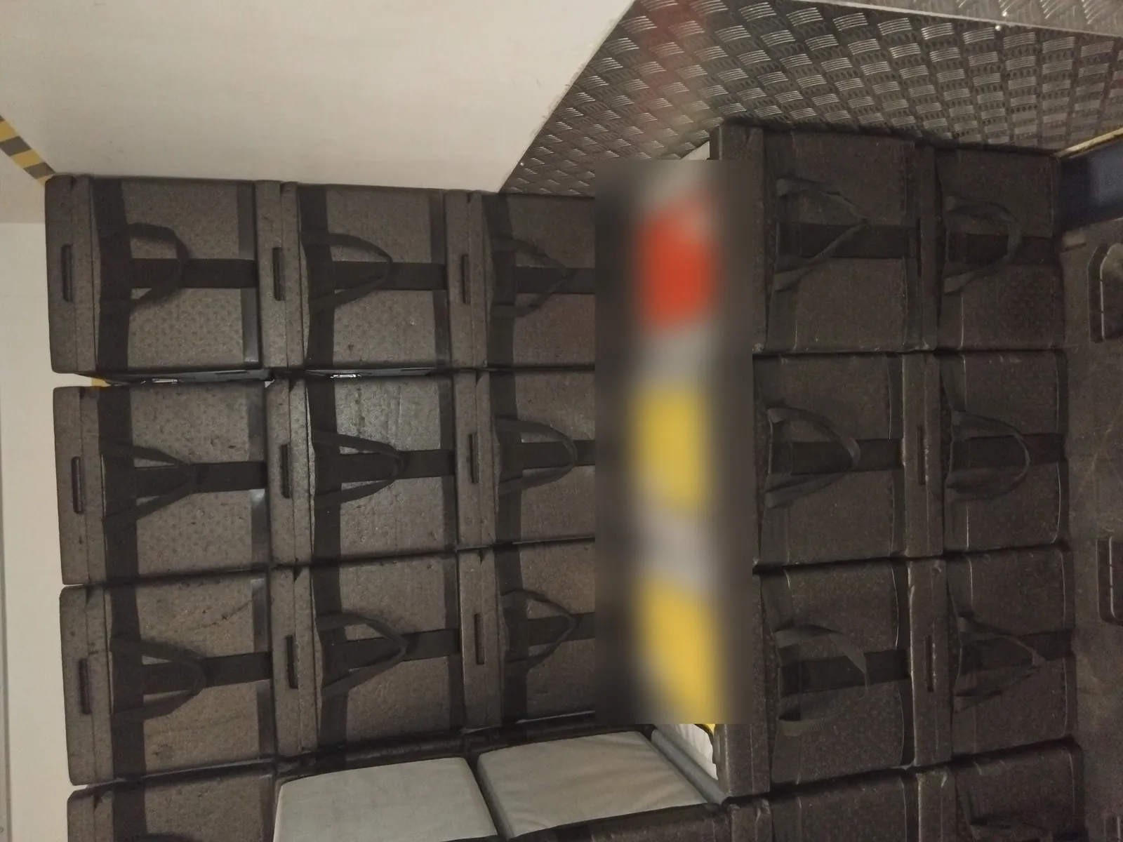 Inside a Red Eagle Logistics courier van loaded with insulated boxes for GDP-compliant temperature-controlled pharmaceutical transport